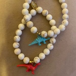Snaffle Bit Set of blue/pink Dino charm bracelets